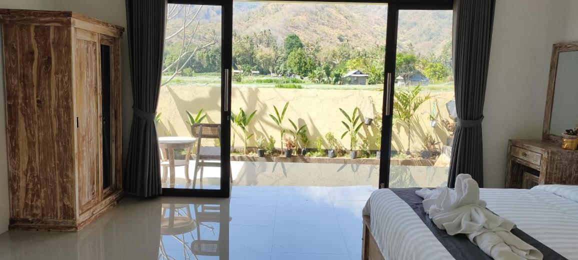 Amed Yudhadewata Hotel Buitenkant foto